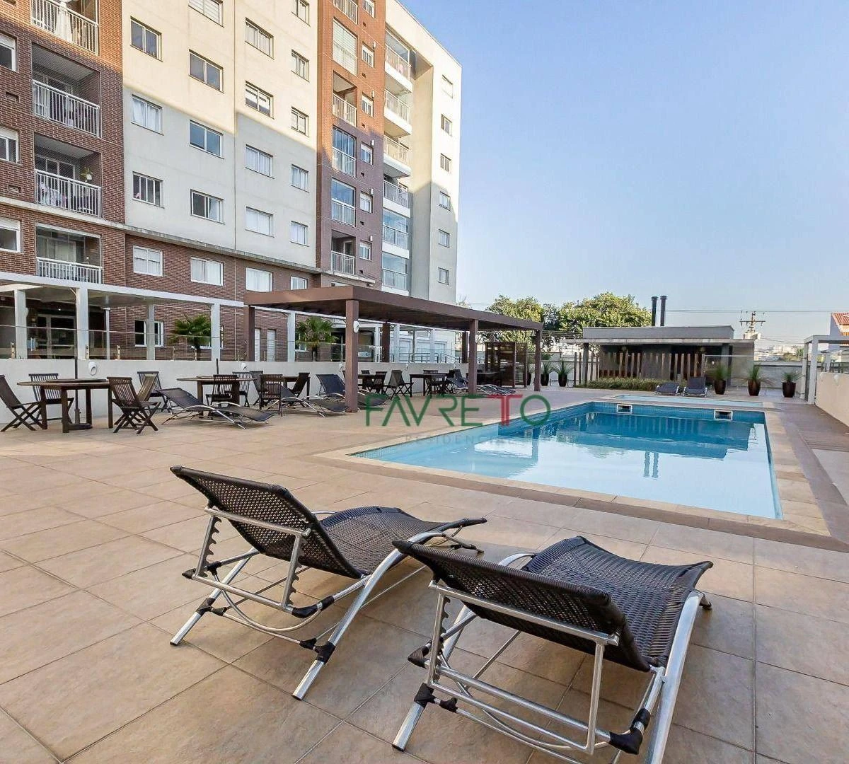 One-bedroom apartment in a building with a pool — photo 12