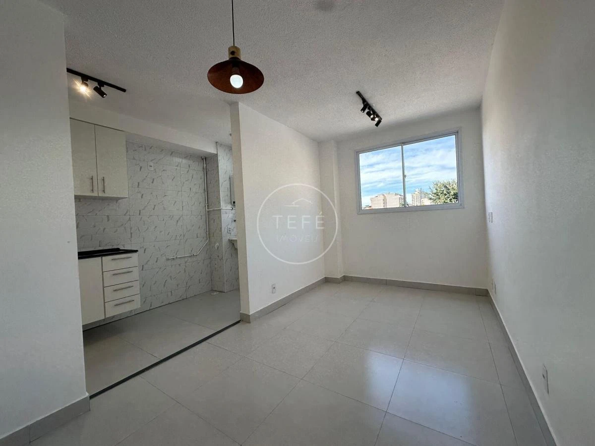 One-bedroom apartment in a building with a pool — photo 10