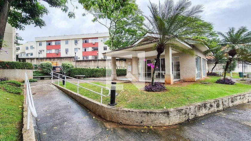 2-bedroom apartment in a building with a pool — photo 13