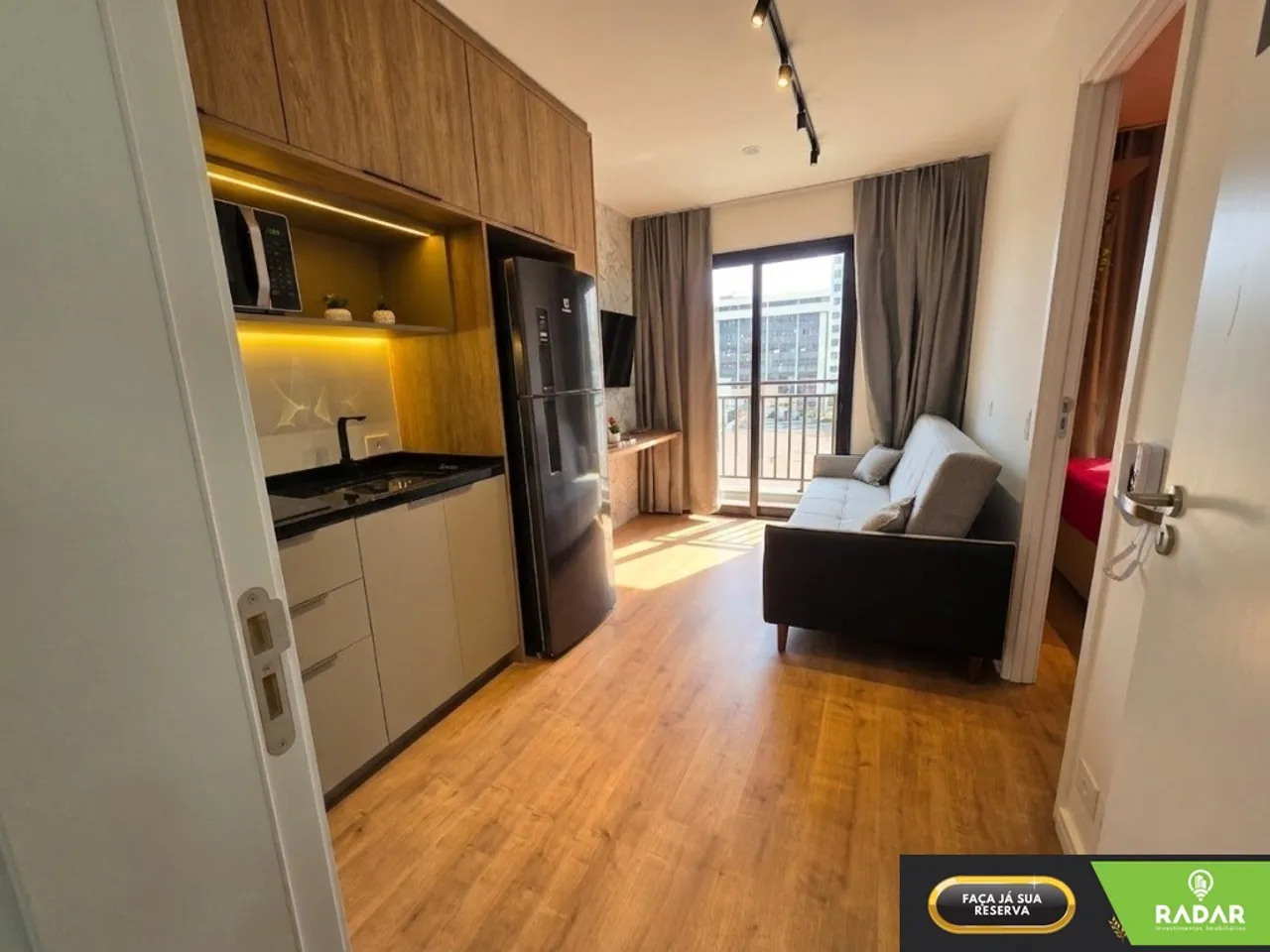 Apartamento de 42 m² com piso de madeira e 1 dormitório — photo 3