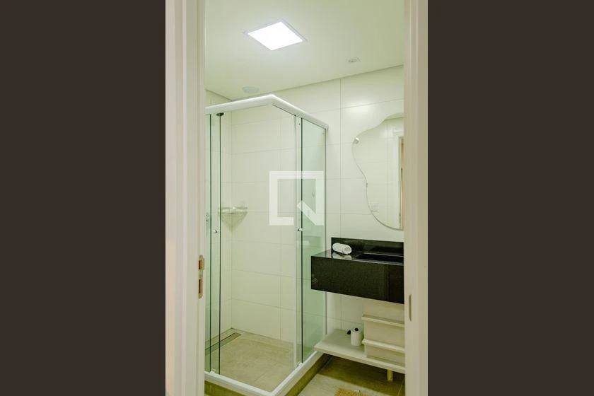 Furnished studio kitnet with kitchen-dining open plan — photo 12