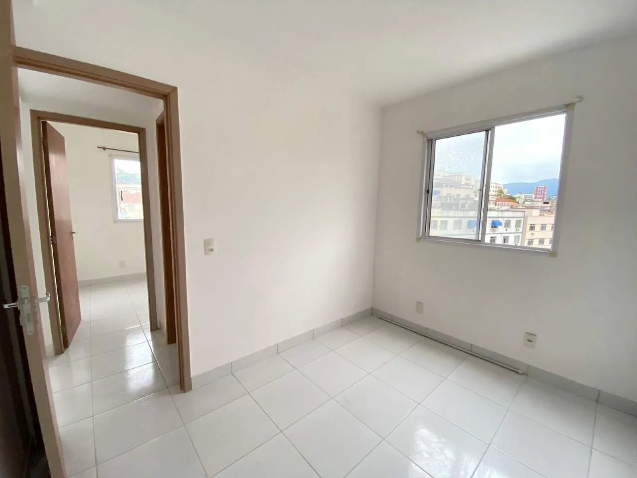 2-bedroom apartment in a building with a pool — photo 4