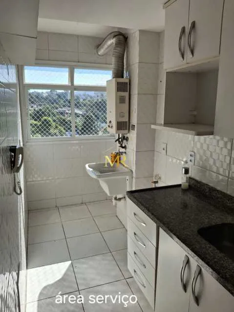 2-bedroom apartment in a building with a pool — photo 6