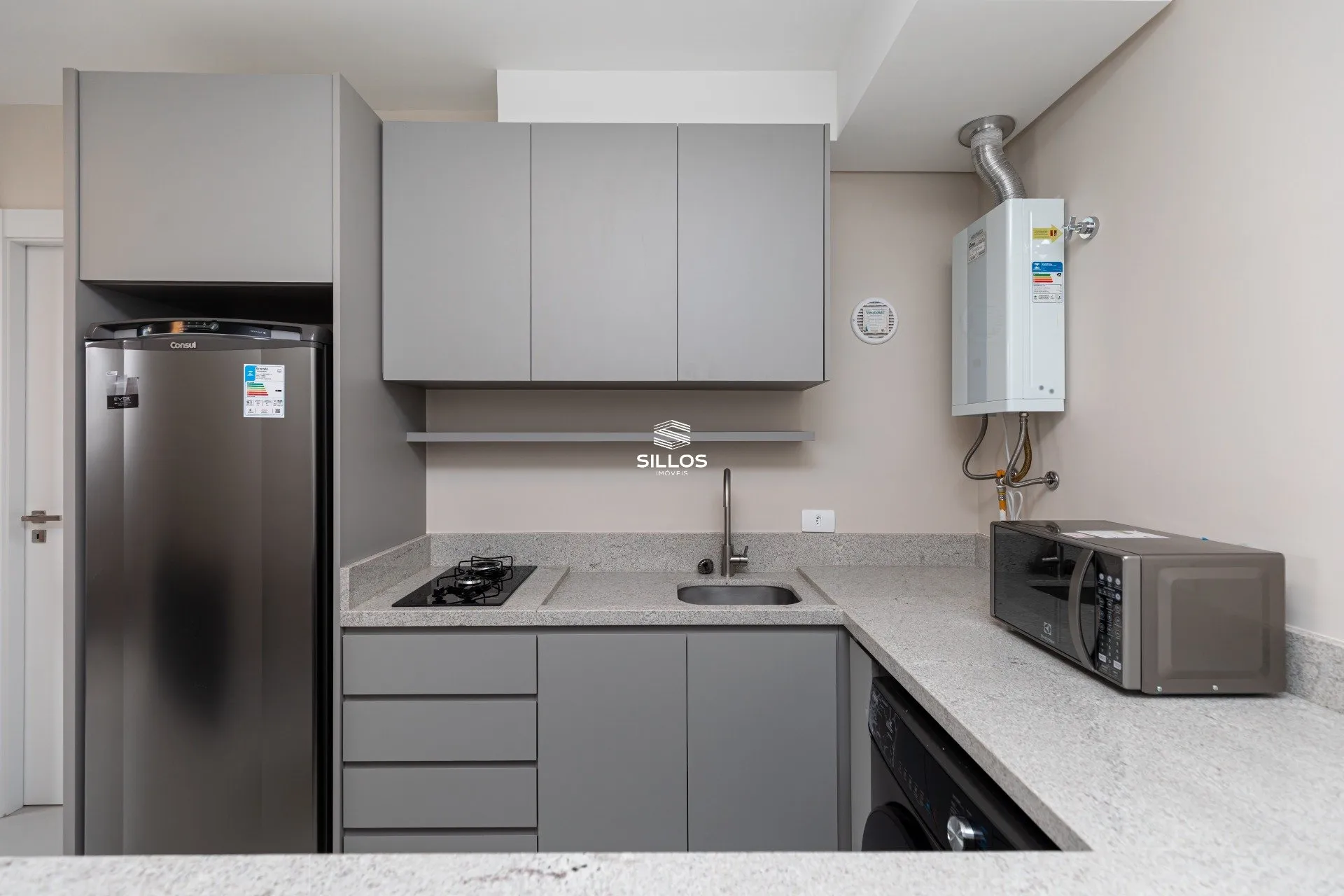 One-bedroom apartment with a washing machine — photo 13