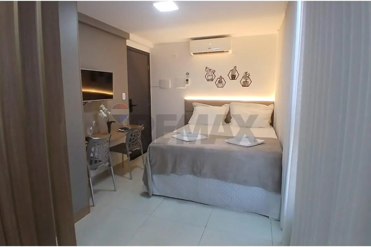 One-bedroom apartment in a building with a pool — photo 21