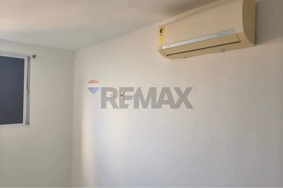 2-bedroom apartment in a building with a pool — photo 8