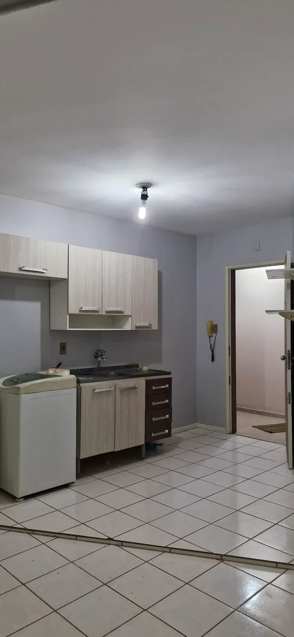 Studio kitnet with a compact cooktop and 1 bedroom — photo 11