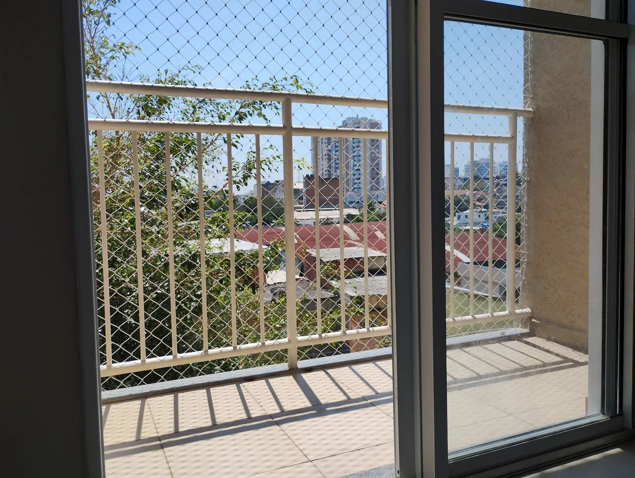2-bedroom apartment in a building with a pool