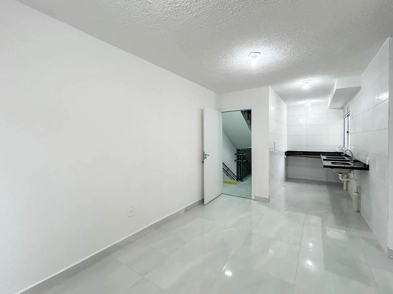 2-bedroom apartment in a building with a gym