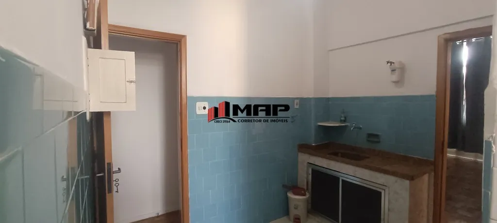 2-bedroom apartment with a compact kitchen and stove — photo 12