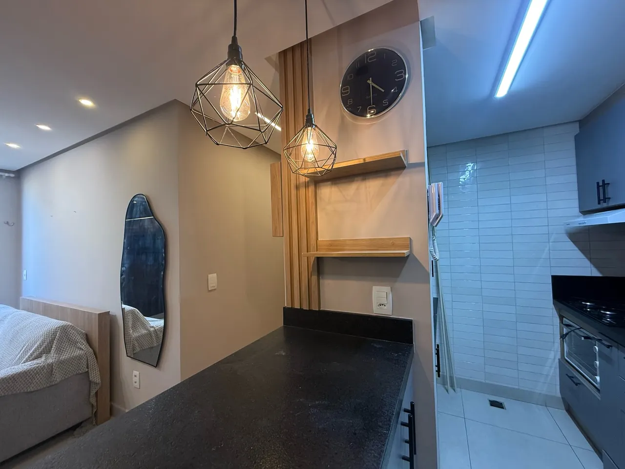 2-bedroom apartment in a building with a pool — photo 16