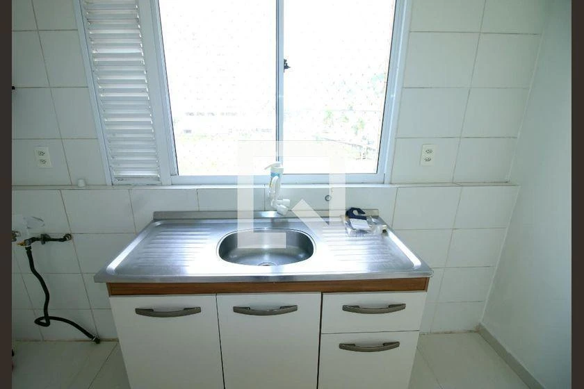 2-bedroom apartment in a building with a pool — photo 26