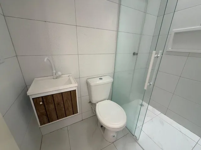 2-bedroom apartment in a building with a pool — photo 7