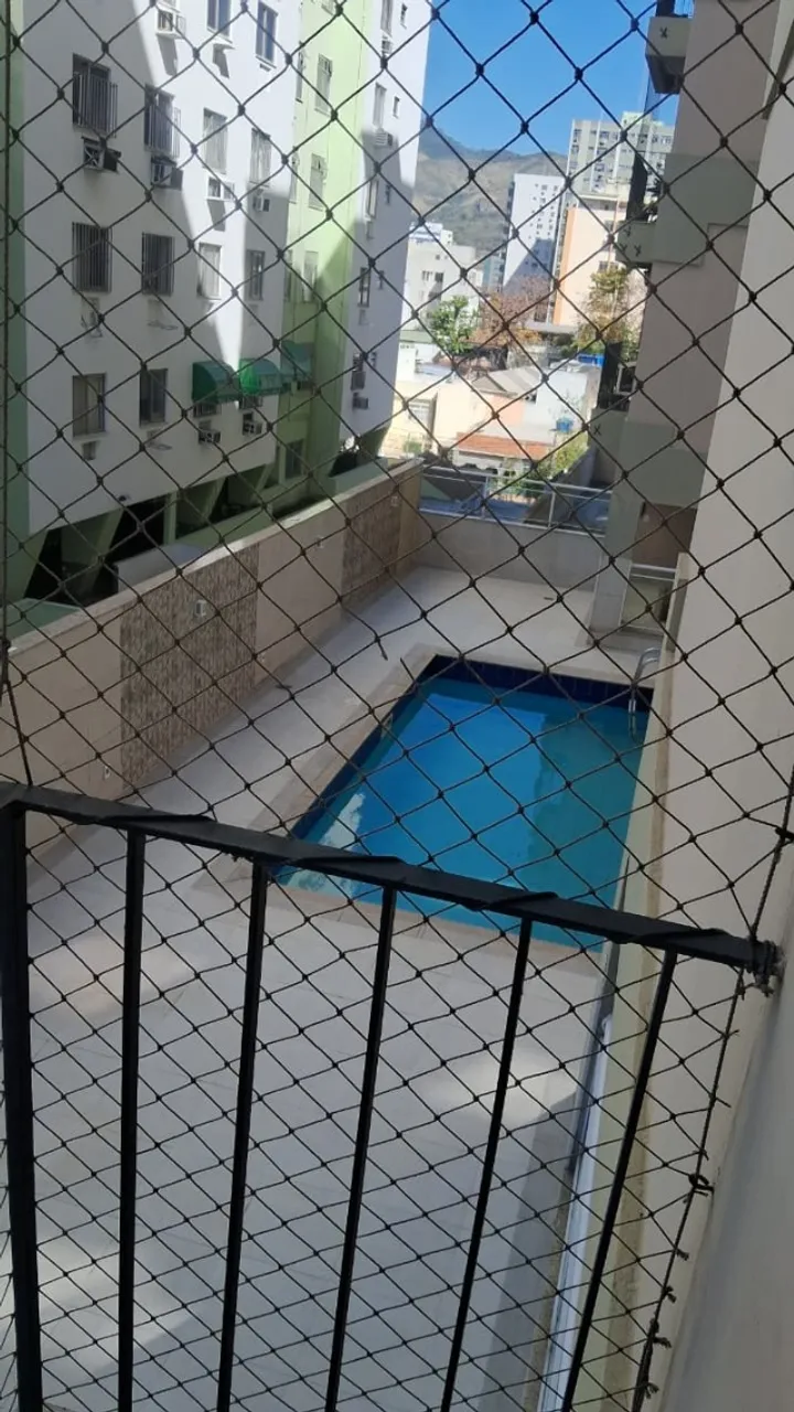 2-bedroom apartment in a building with a pool — photo 15