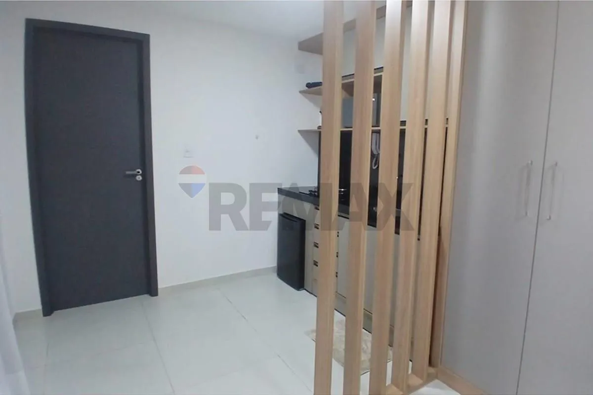 One-bedroom apartment in a building with a pool — photo 13