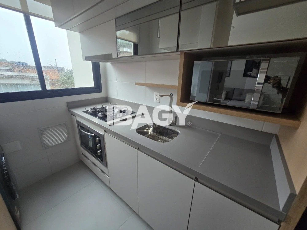 2-bedroom apartment in a building with a pool — photo 8