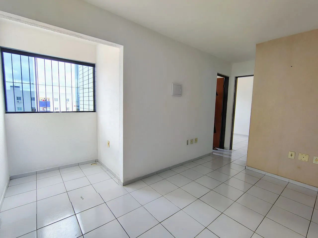 2-bedroom apartment in a building with a pool