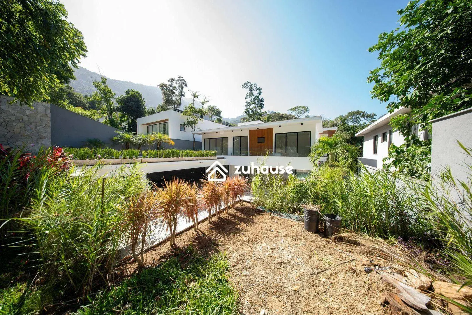 Casa com 5 quartos e cozinha em conceito aberto — photo 37