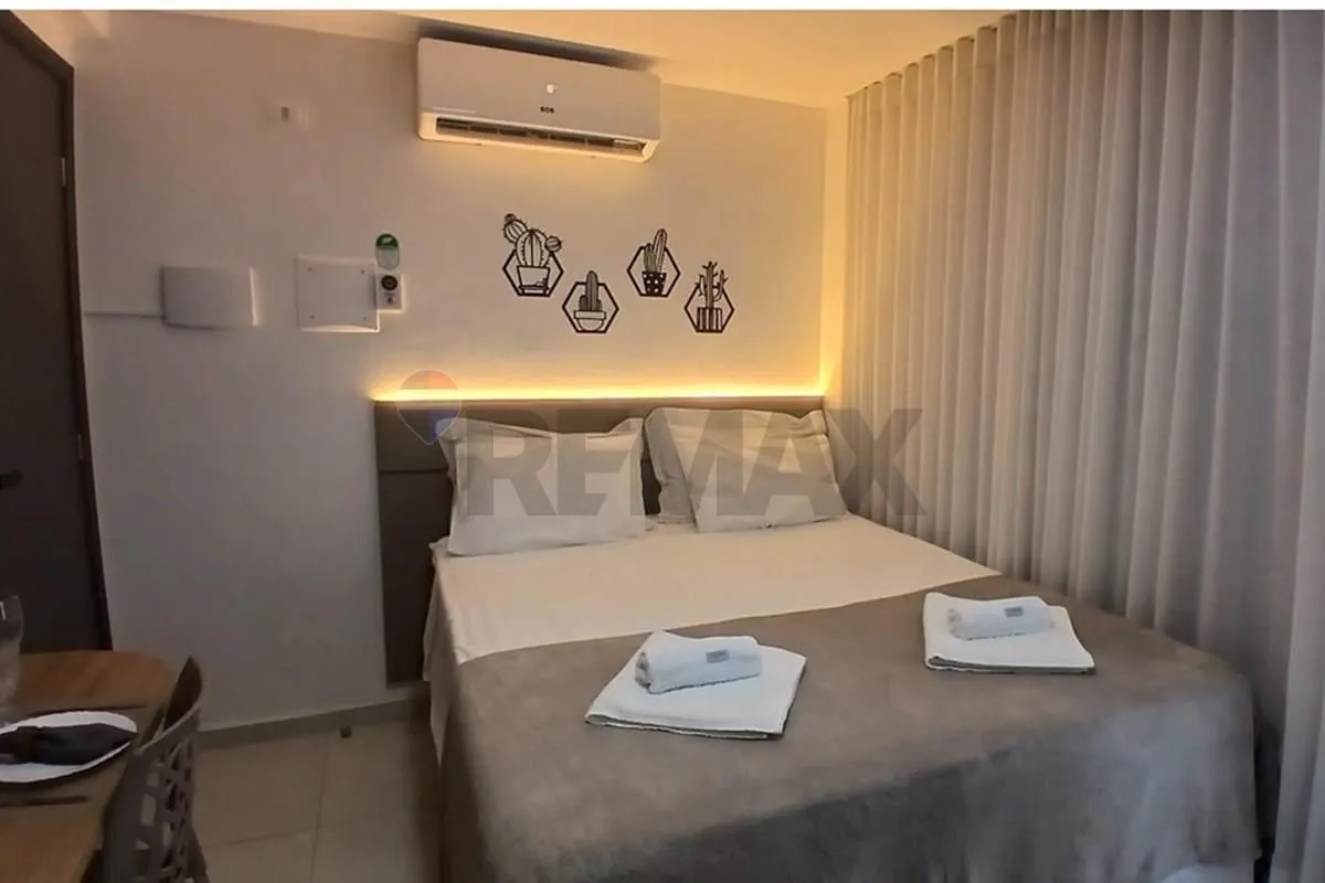 One-bedroom apartment in a building with a pool — photo 24