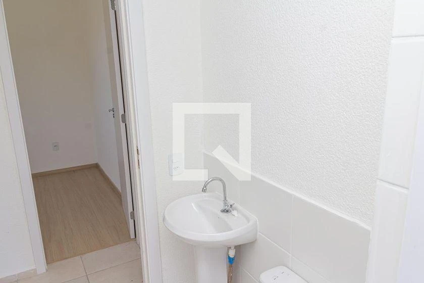 2-bedroom apartment in a building with a pool — photo 32