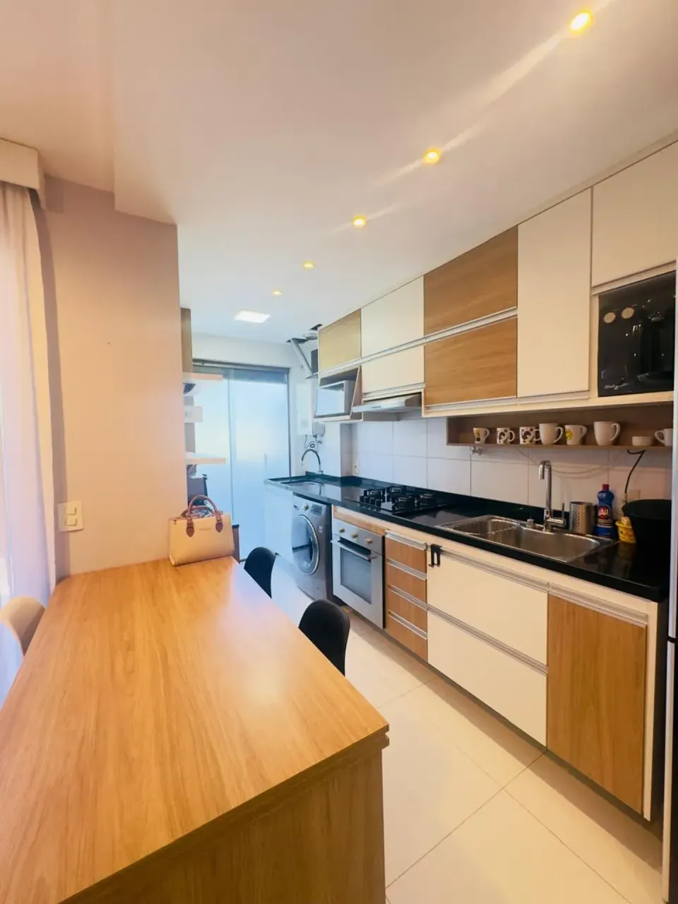 Apartamento com 2 dormitórios e cozinha em conceito aberto a gás — photo 2