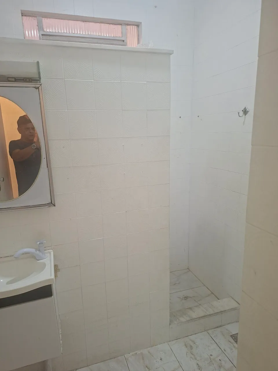 House with an electric shower and laundry area — photo 5