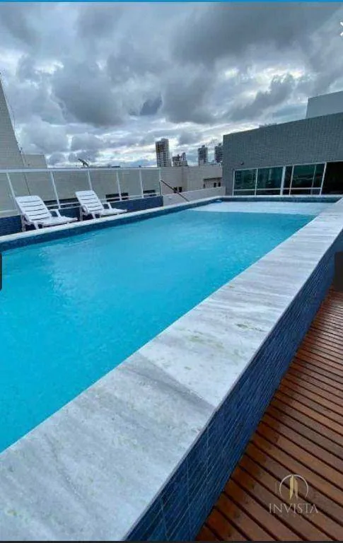 2-bedroom apartment in a building with a pool — photo 15