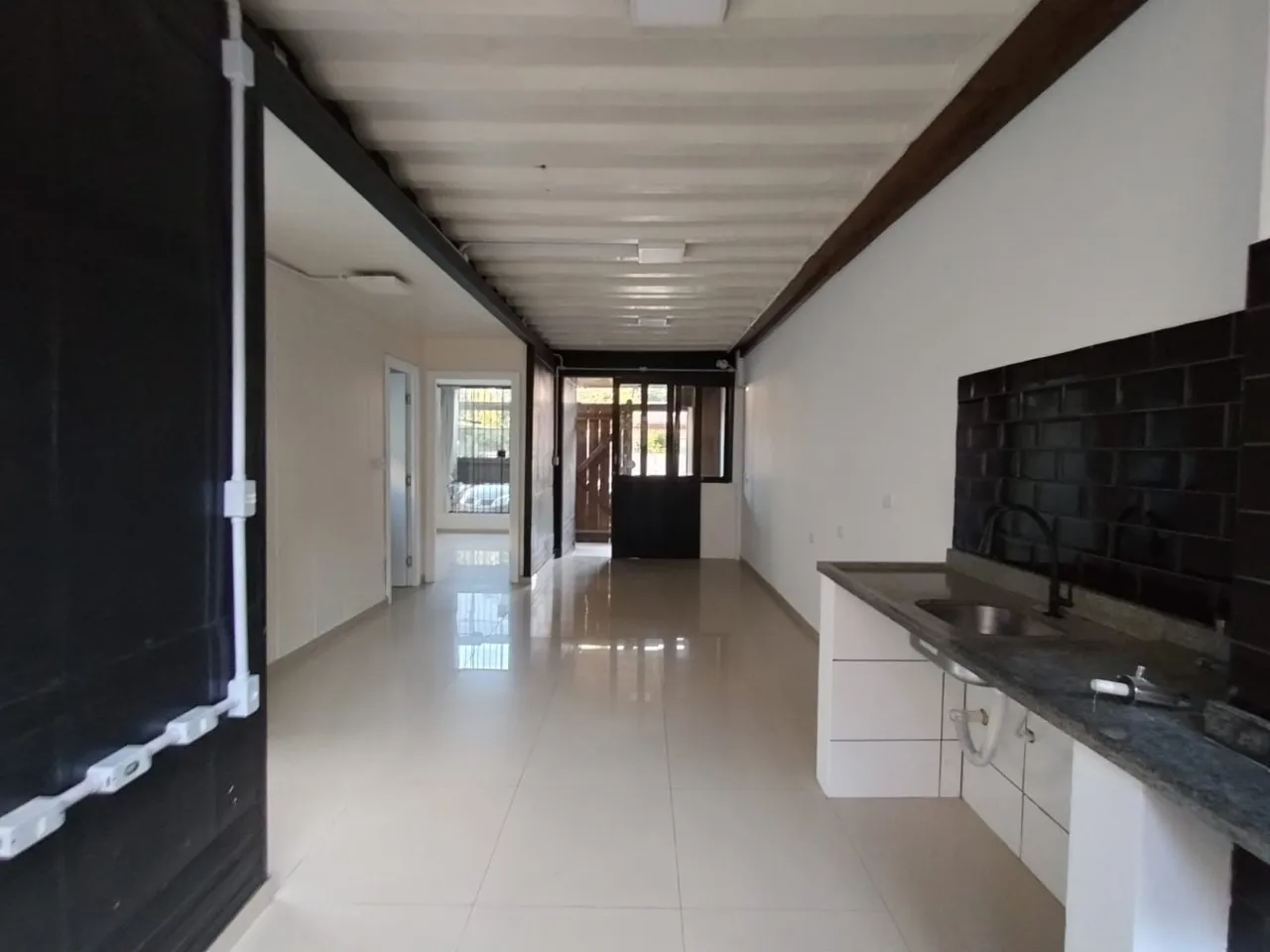 Casa de 2 quartos com jardim e churrasqueira privativa