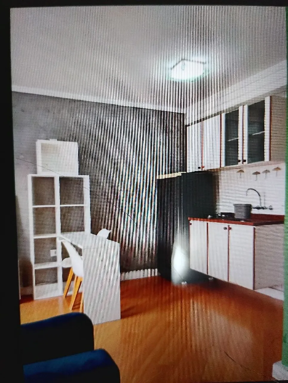 Wood or laminate floors in a one-bedroom apartment, 29 m² — photo 2
