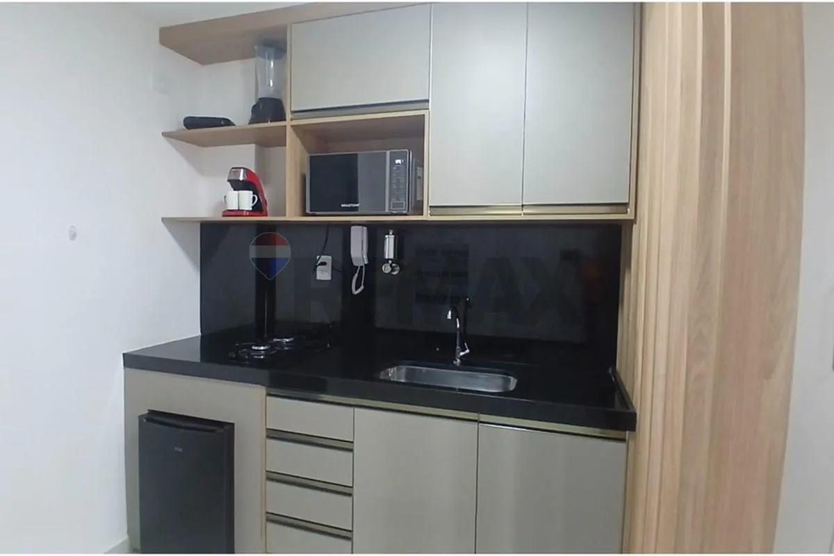 One-bedroom apartment in a building with a pool — photo 15