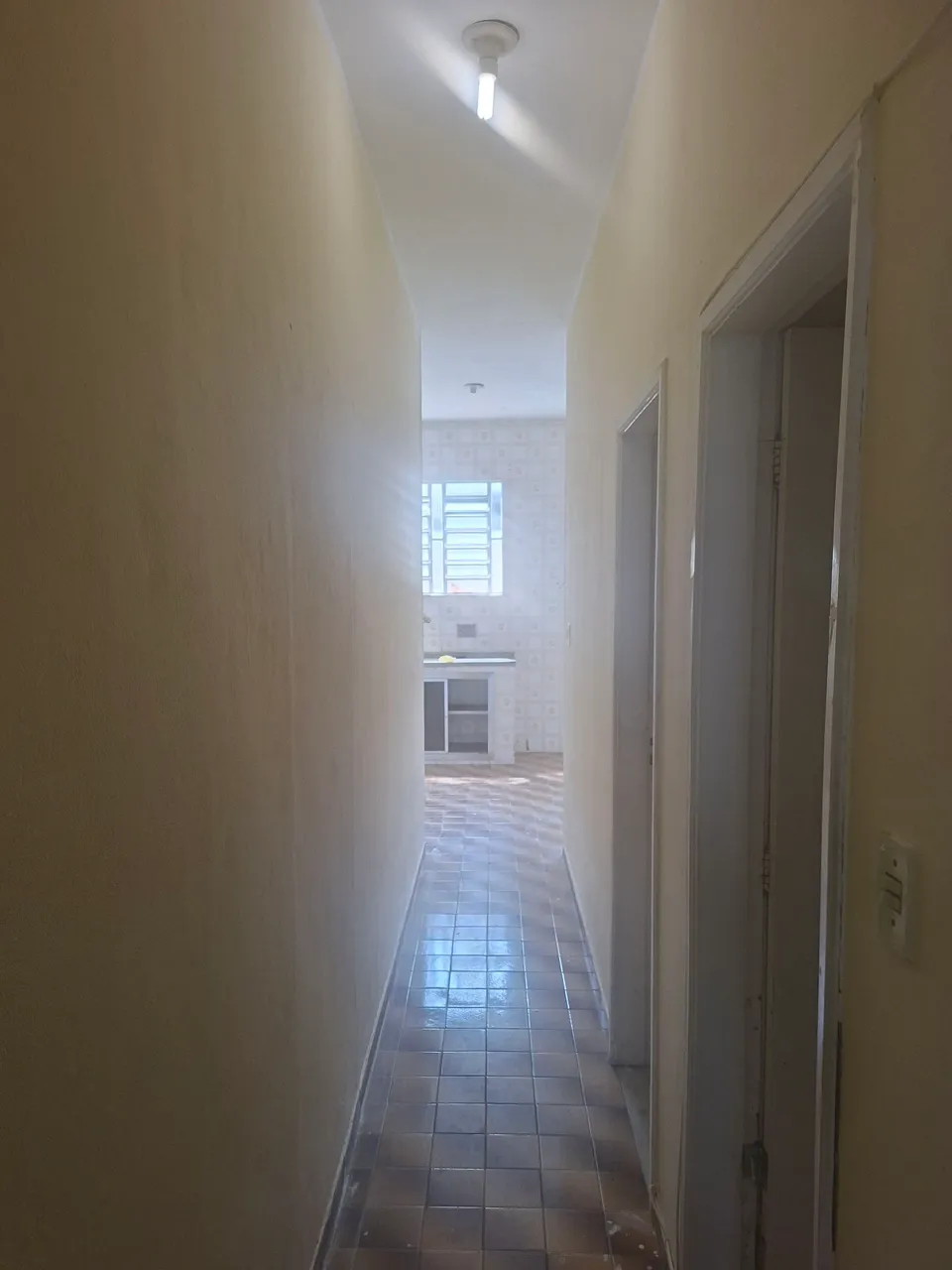 House with an electric shower and laundry area — photo 3