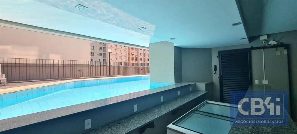 2-bedroom apartment in a building with a pool — photo 4