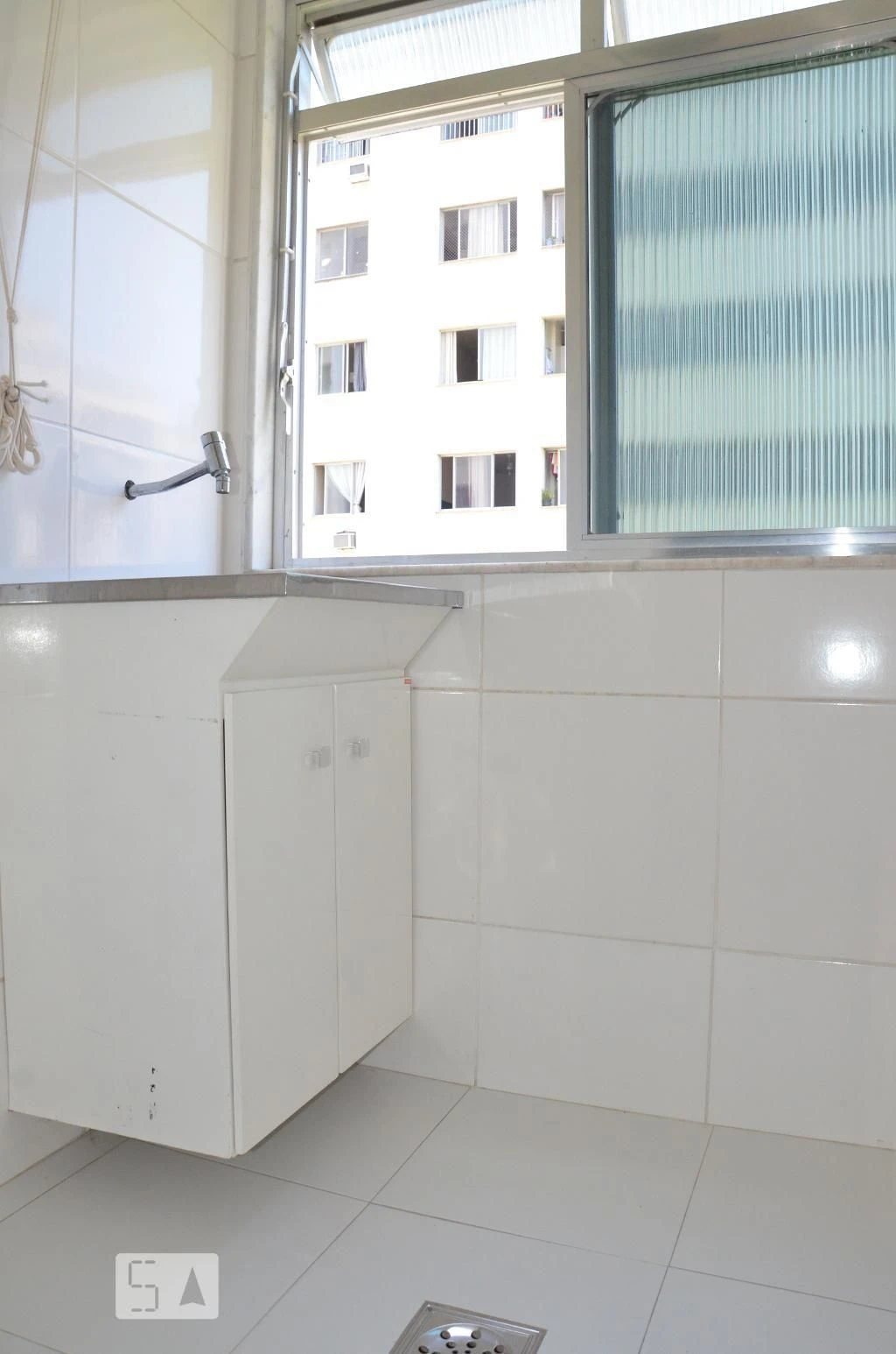 2-bedroom apartment in a building with a pool — photo 14