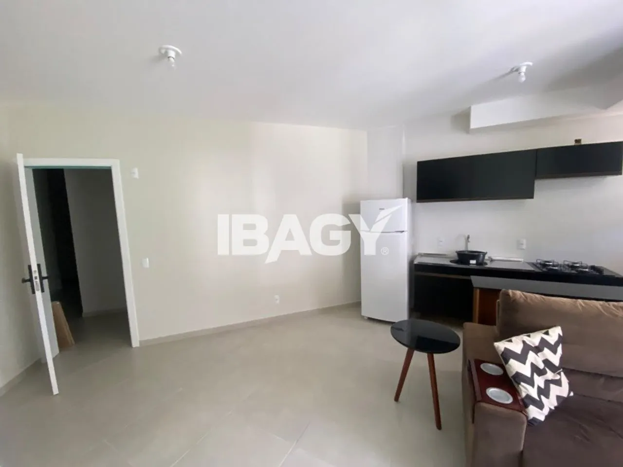 2-bedroom apartment in a building with a pool — photo 2