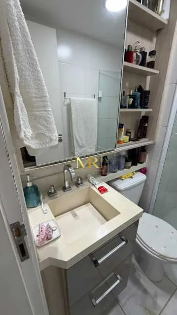 2-bedroom apartment in a building with a pool — photo 13
