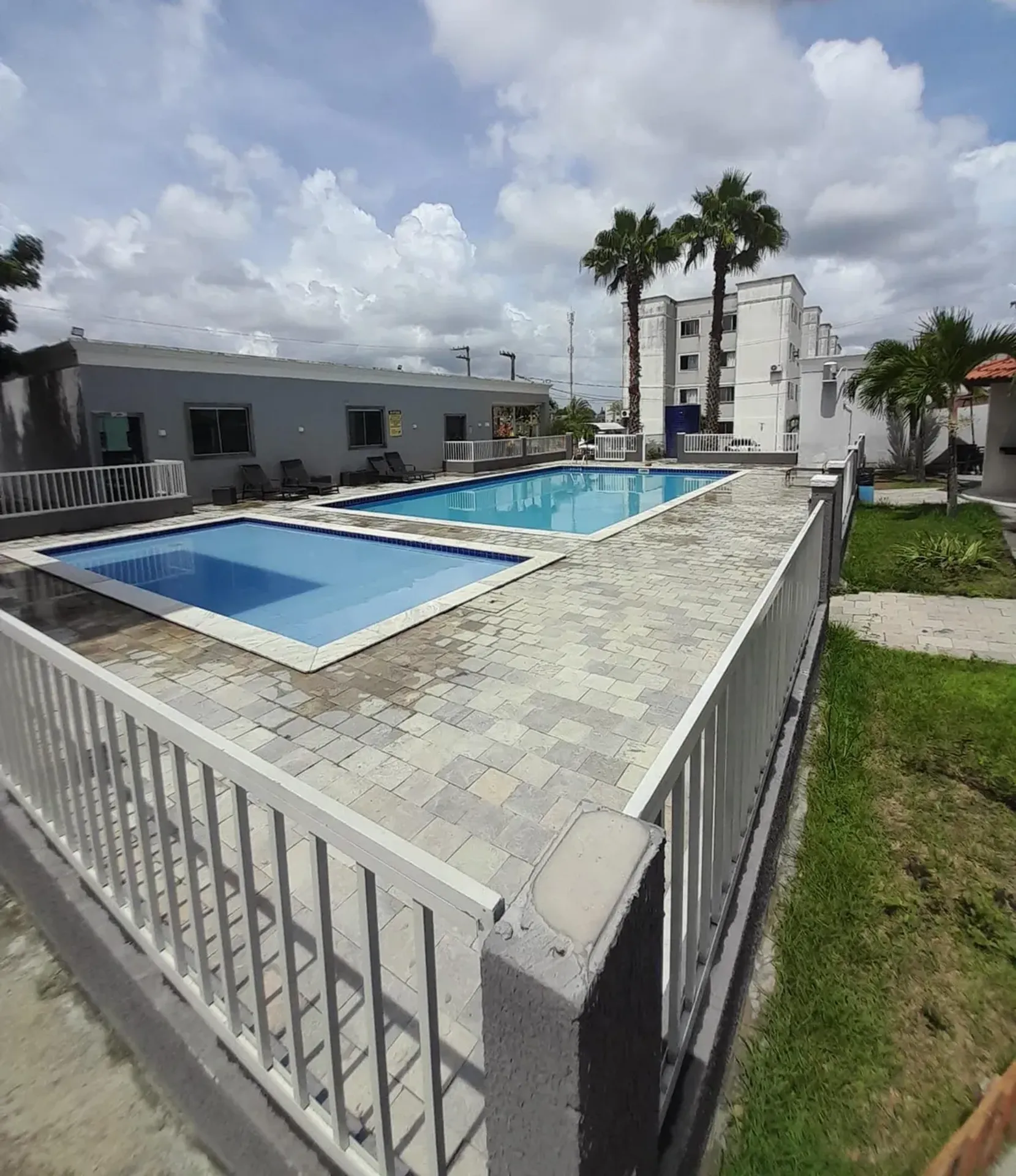 2-bedroom apartment in a building with a pool — photo 6
