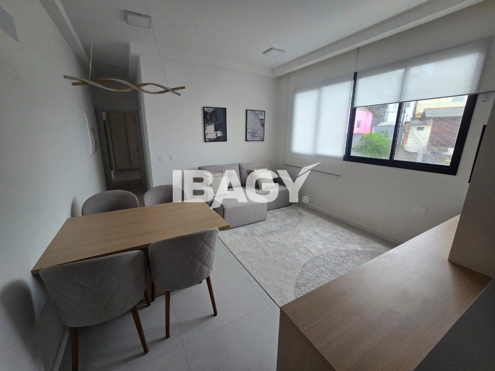 2-bedroom apartment in a building with a pool