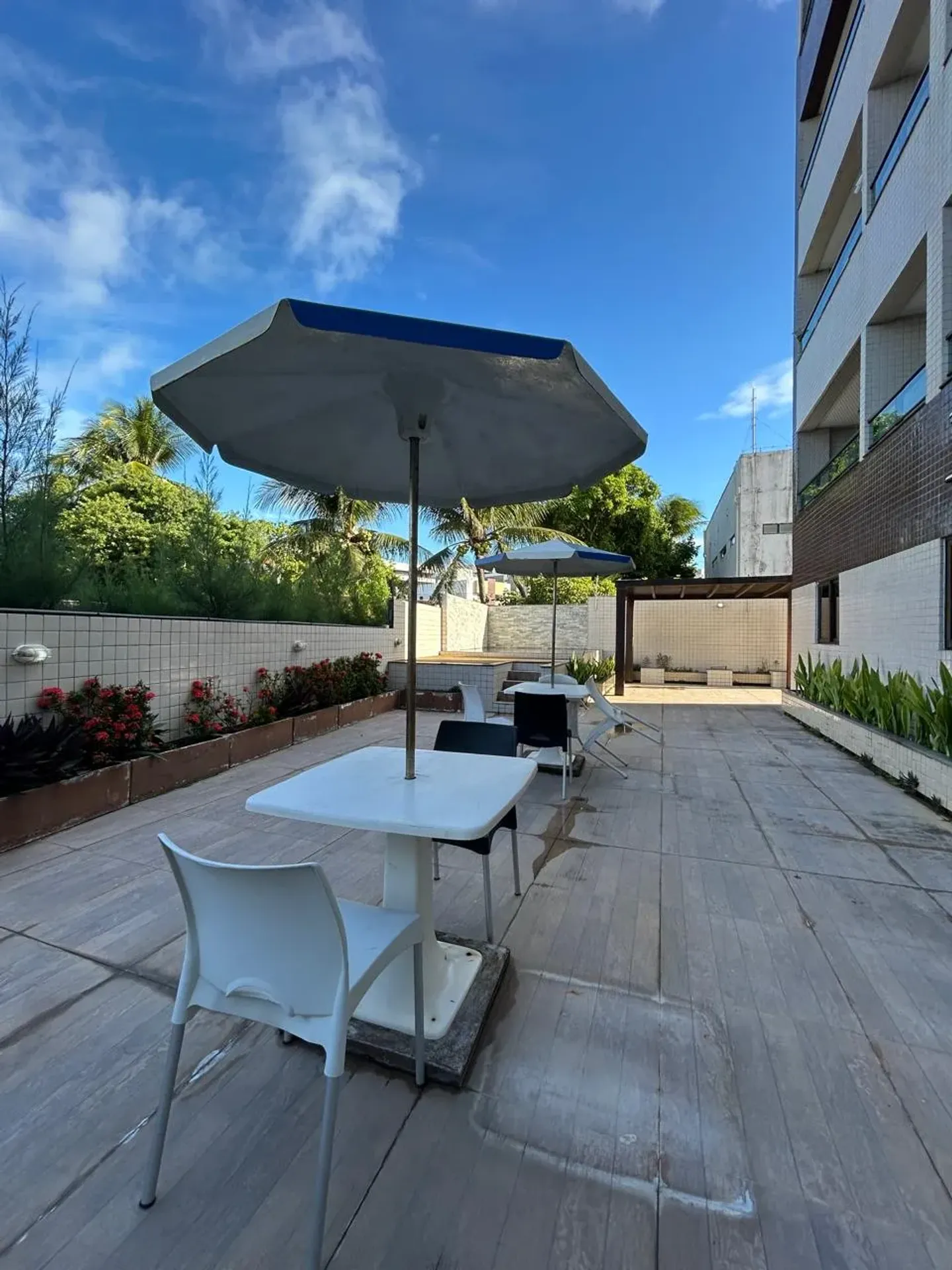 1-bedroom apartment with balcony and shared pool area — photo 6
