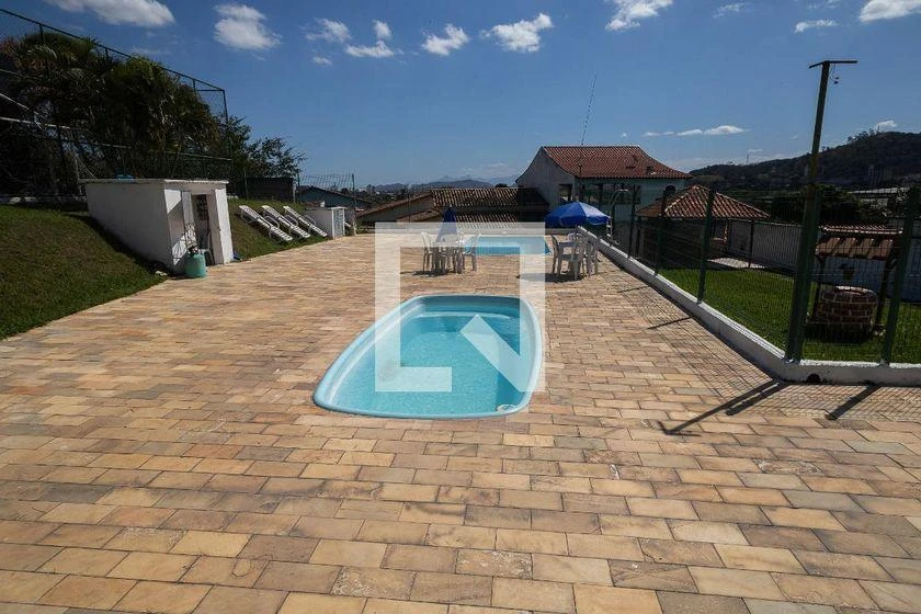 2-bedroom apartment in a building with a pool — photo 4