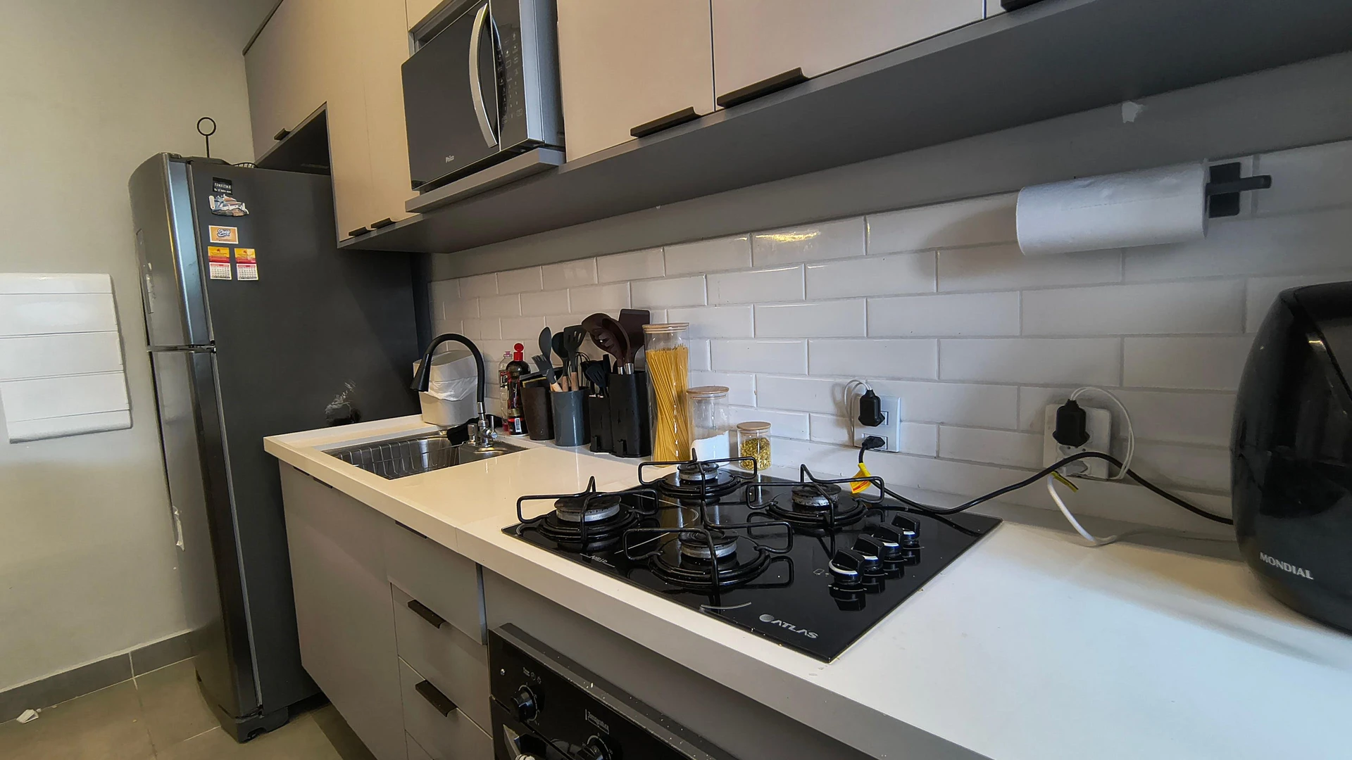 Furnished apartment with open-plan kitchen and balcony — photo 24