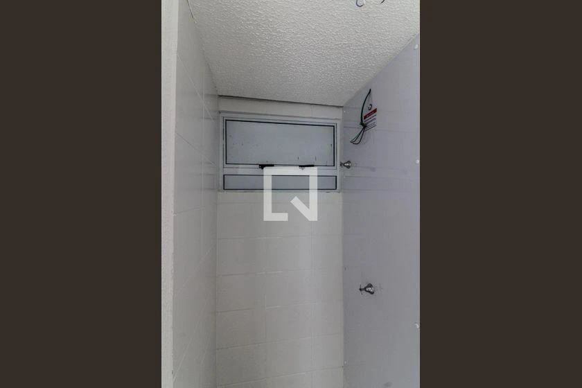2-bedroom apartment in a building with a pool — photo 32