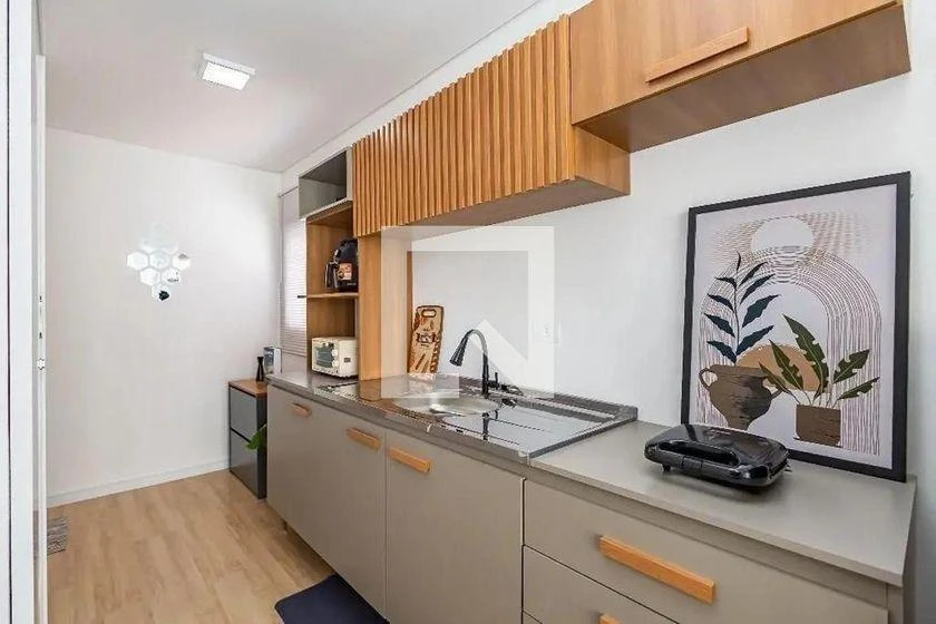 27 m² studio with a glass-enclosed balcony and a home office — photo 8