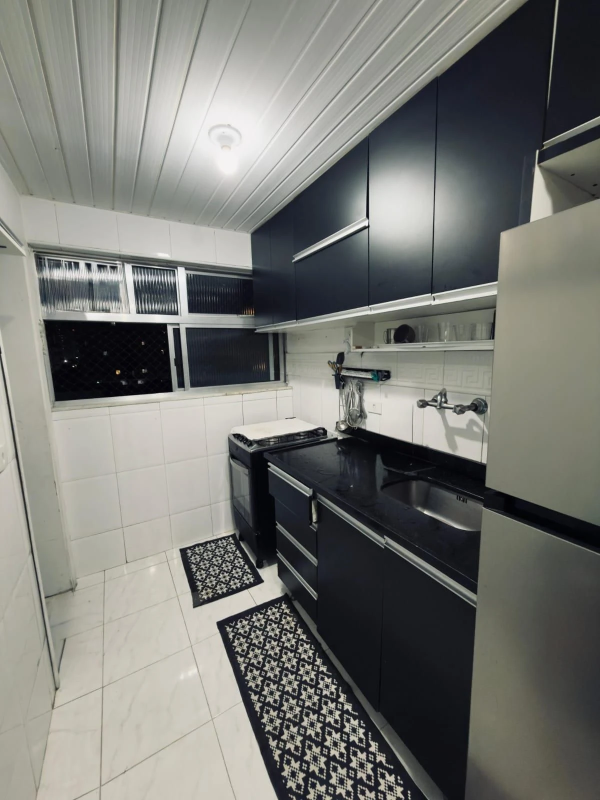 Walk-in closet in a 3-bedroom apartment, 230 m² — photo 5