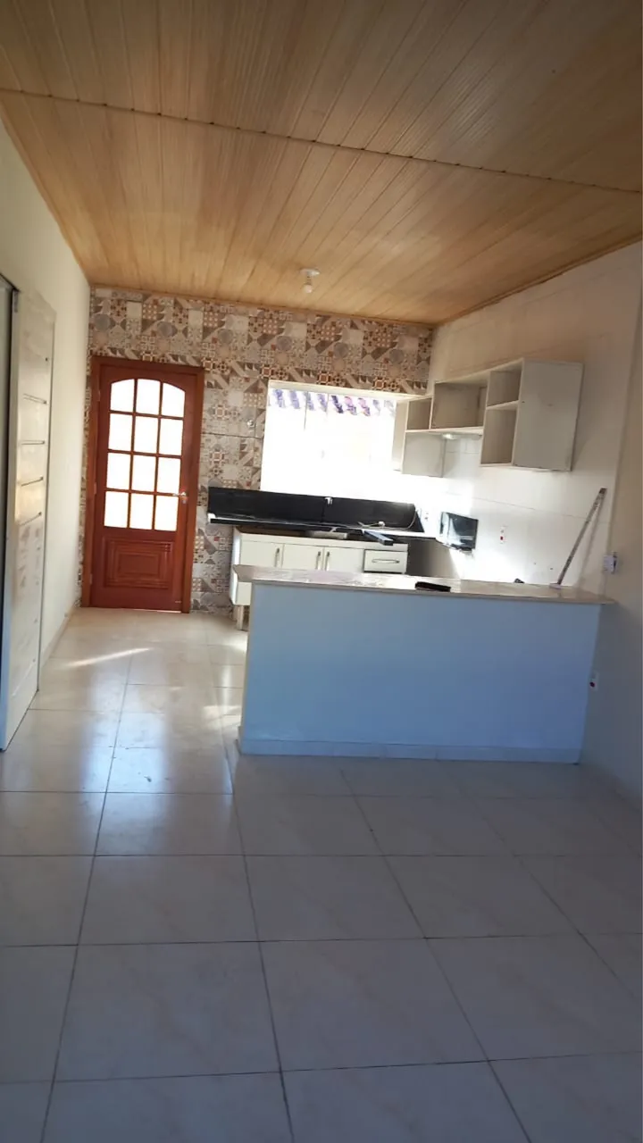 House with 2 bedrooms and an integrated open-plan kitchen — photo 7