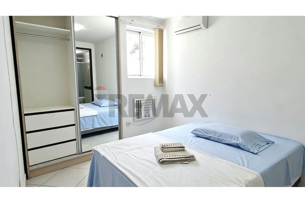 One-bedroom apartment in a building with a pool — photo 4