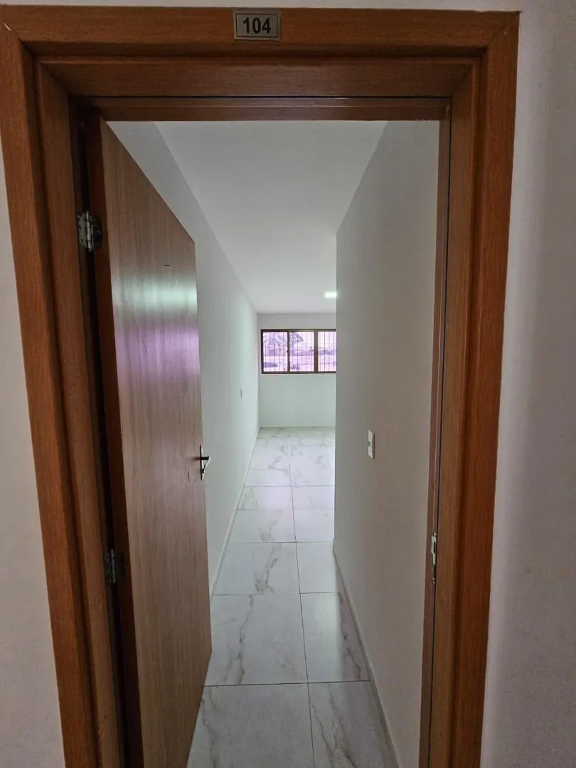 2-bedroom apartment in a building with a pool — photo 9