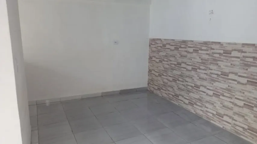 Estúdio sem mobília com cozinha aberta a gás e área de lavanderia — photo 14
