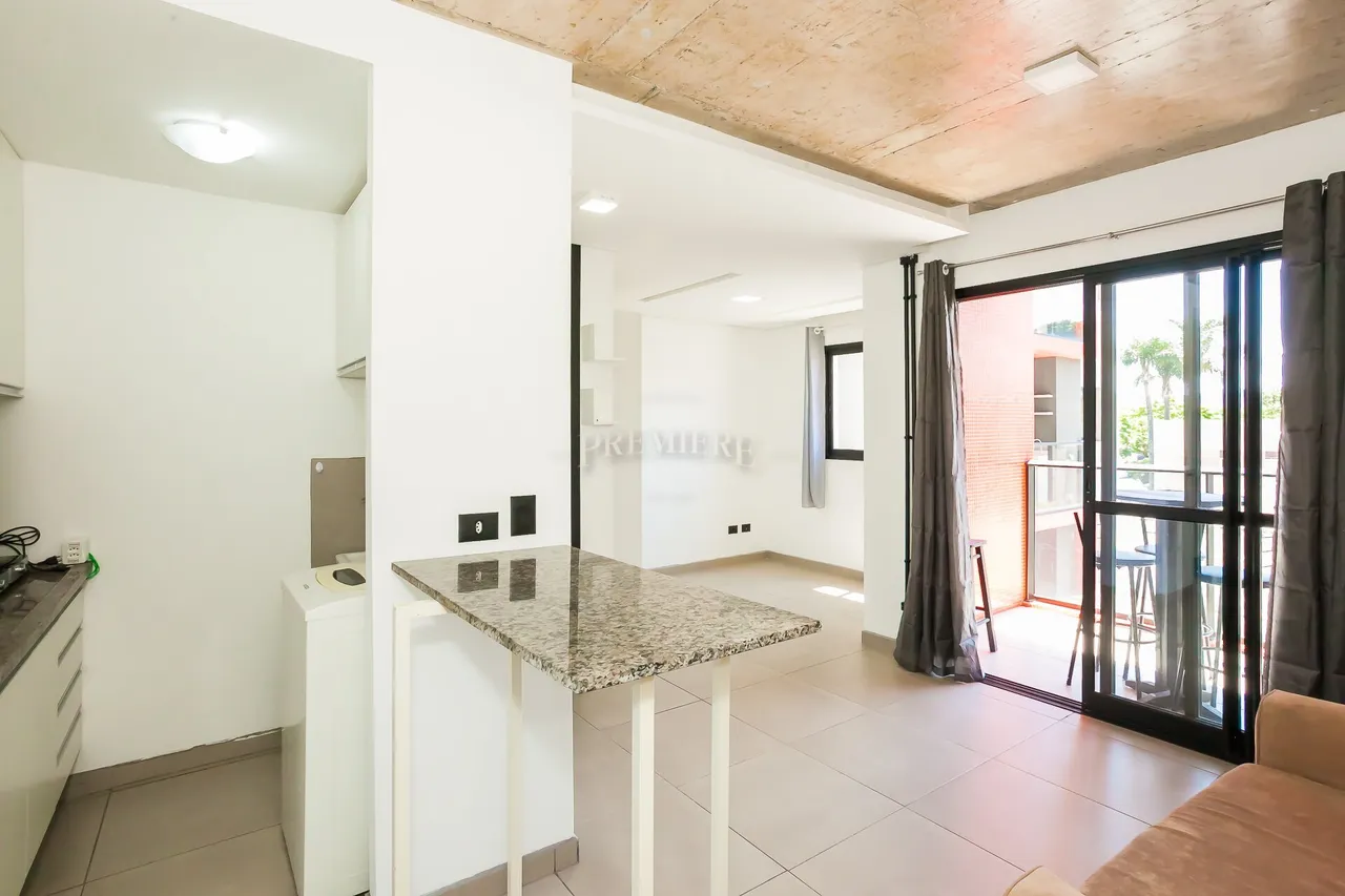 Estudio con cocina abierta y muebles empotrados — photo 5