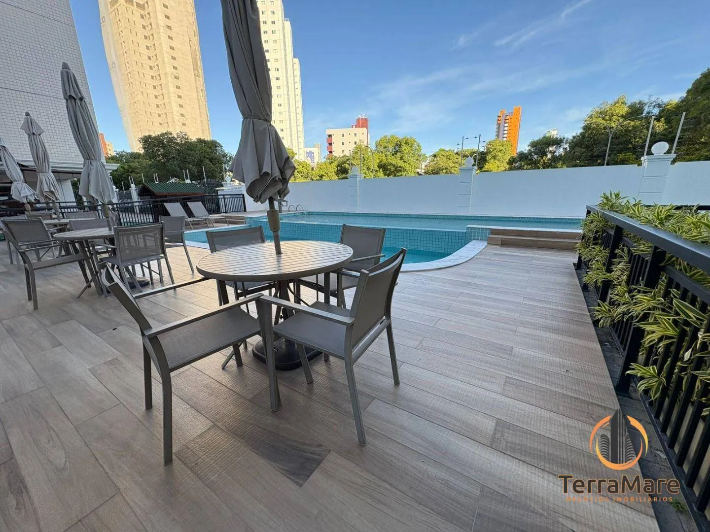 2-bedroom apartment in a building with a pool — photo 18