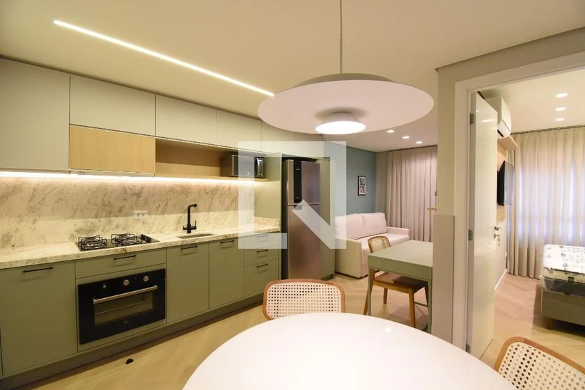 Furnished 1-bedroom apartment with open-plan gas kitchen — photo 2